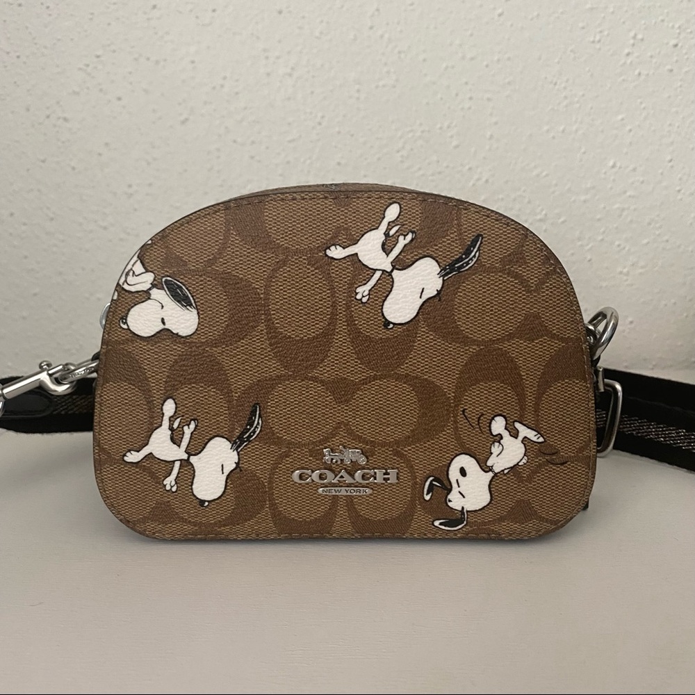 Coach Coach X Peanuts Mini
Serena Crossbody In Canvas With
Snoopy
